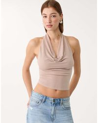 Stradivarius - Top Allacciato Al Collo Cipria Glitterato - Lyst