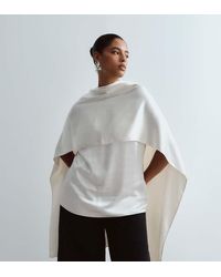 ARRANGE - Curve Satin Underlay Cape Top - Lyst
