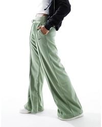 Nike - Mini Swoosh High Rise Wide Leg Jersey Trousers - Lyst