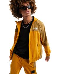 The North Face - Nse - giacca sportiva rivestita gialla e marrone - Lyst