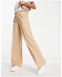 Vero Moda - Stand alone - pantaloni color crema a fondo ampio con vita elasticizzata - Lyst
