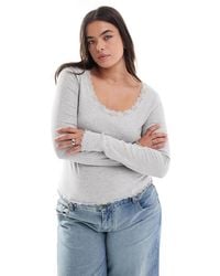 ASOS - Asos design curve - t-shirt à manches longues et encolure dégagée avec bords en dentelle - Lyst