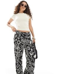 Vero Moda - Pantaloni Plissé A Fondo Ampio E Vita Alta Con Stampa Tropicale - Lyst