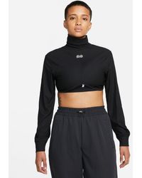 Nike Ribbed Turtleneck Top in Green | Lyst