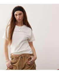 Collusion - Top Sportivo Aderente Color Écru Con Profili A Contrasto - Lyst