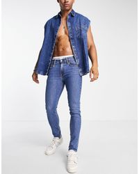 Levi's - Jeans skinny affusolati lavaggio medio - Lyst