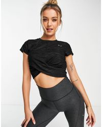 PUMA - Studio Yoga Cropped Twist T-shirt - Lyst
