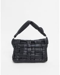 mango black solid handheld bag