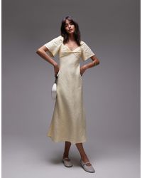 & Other Stories - Robe longueur mollet en lin à manches bouffantes et décolleté en cœur torsadé - jaune beurre - Lyst
