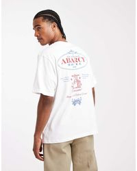 Jack & Jones - T-Shirt Oversize Bianca Con Stampa Di Hotel Sul Retro - Lyst