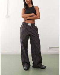Nike - Pantaloni A Fondo Ampio Neri E Grigi A Righe - Lyst