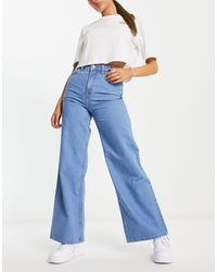 Lee Jeans - Stella - jeans svasati a zampa a vita alta lavaggio medio - Lyst