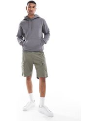 Hollister - Sudadera Gris Medio Holgada Con Capucha Y Logo De Icono De - Lyst
