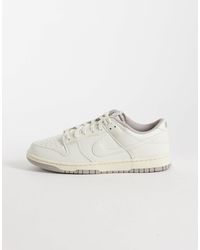 Nike - Dunk low retro prm baskets en cassé - Lyst