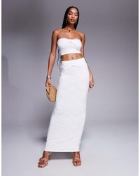 Kaiia - Exclusivité - - jupe double épaisseur d'ensemble coupe longue en dentelle près du corps à détail noué - ivoire - Lyst