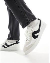 Levi's - Sneak - sneakers color crema con logo nero - Lyst