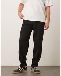 ASOS - Pantalones De Vestir Negros De Corte Tapered Extragrande De - Lyst