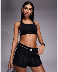 adidas Originals - Adidas Training Optime Essentials Mid Support Sports Bra - Lyst