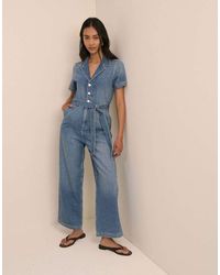 Nobody's Child - Mid Wash Denim Tie Waist Mylos Jumpsuit - Lyst