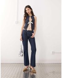 Lioness - Denim Low Rise Flared Jeans Co-ord - Lyst
