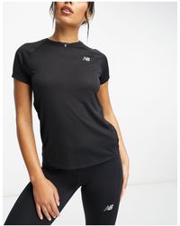 New Balance - Impact run - t-shirt a maniche corte nera - Lyst