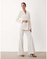 Mango - Iguana Tailored Flared Pants - Lyst