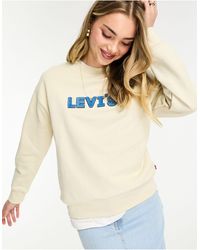 Levi's - Sudadera color crema con logo en el pecho - Lyst