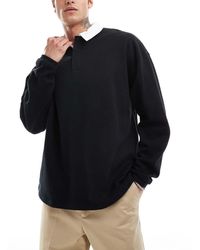 ASOS - Sudadera Negra Estilo Rugby De Corte Extragrande Con Cuello Tipo Polo De - Lyst