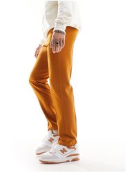 ASOS - Pantaloni eleganti slim fit color arancione bruciato - Lyst