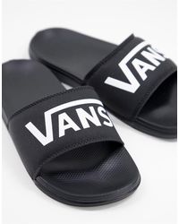 Vans - Sandalias negras sin cierres con logo costa - Lyst