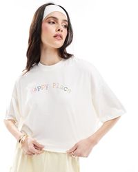 ONLY - T-shirt crop top à imprimé happy place - Lyst