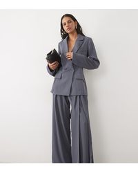 SNDY'S - Tailored Belted Tie Drape Pleat Detail Wide Leg Trousers Co-Ord - Lyst