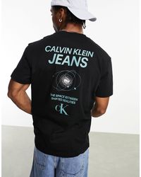 Calvin Klein - Camiseta negra con estampado gráfico en la espalda future galaxy - Lyst