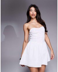 Missy Empire - Missy Empire Linen Look Bandeau Sweetheart Neckline Mini Skater Dress - Lyst