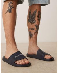 Calvin Klein - Logo Sliders - Lyst