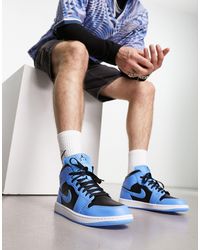 Nike - Air 1 - baskets mi-hautes - noir et universitaire - Lyst