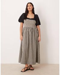 ASOS - Asos design curve – maxikleid mit gesmoktem oberteil, puffärmeln und schwarz-weißen vichy-karos - Lyst