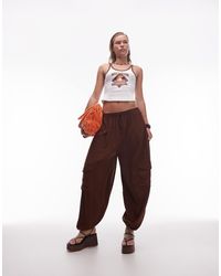 ASOS - Pantalon bouffant texturé avec poches fonctionnelles - chocolat - Lyst