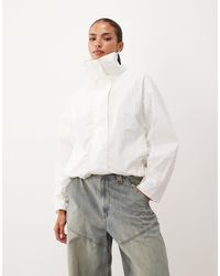 Lioness - Shoreline Funnel Neck Oversized Utility Toggle Windbreaker Jacket - Lyst