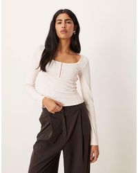 ASOS - Top à manches longues et col arrondi avec détails - Lyst