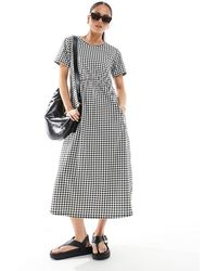 Threadbare - – kurzärmeliges midikleid aus jersey mit schwarz-weißem vichy-karomuster und taschen - Lyst
