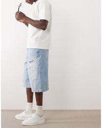 ASOS - Short long en jean avec déchirures - clair délavé - Lyst