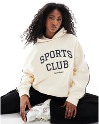 4th & Reckless - Sweat à capuche à manches contrastantes avec logo et motif sports club brodés - crème - Lyst