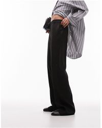 TOPSHOP - Pantaloni sartoriali con fondo ampio neri - Lyst