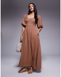 River Island - Robe mi-longue en aspect lin à manches bouffantes - taupe - Lyst