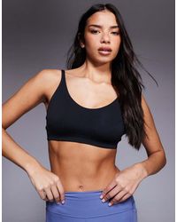 Under Armour - Motion Sports Bra - Lyst