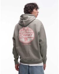 Tommy Hilfiger - Sudadera Verde Salvia Con Capucha Y Estampado Gráfico Circular En La Espalda De - Lyst