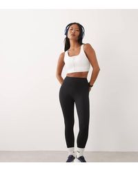 4505 - Petite Icon Active Tie Waist Run legging With Phone Pocket - Lyst