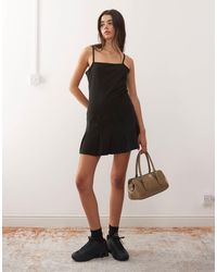Collusion - 90s Pinstripe Pleated Dropped Waist Mini Dress - Lyst