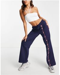 Fila Track pants and sweatpants for Women | Online Sale up to 66% off | Lyst